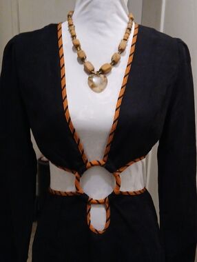 Black Dress with Orange Trim and Ring Waist Detail